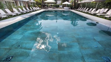 Seasonal outdoor pool, pool umbrellas, pool loungers