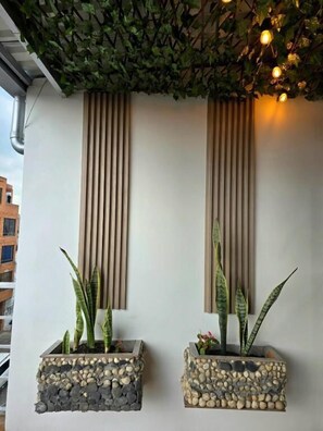 Deluxe Apartment, Housekeeping, City View | Interior detail - Hotel Penthouse-Terraza-Cario Infantil  (Bogotá)