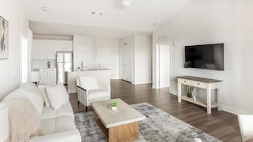 Standard Apartment (2 Bedrooms) | Living area | 50-inch TV with digital channels