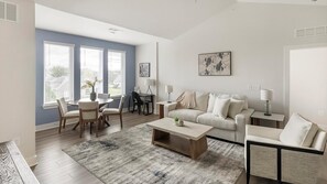 Standard Apartment (2 Bedrooms) | Living area | 50-inch TV with digital channels - Landing Apartments Huntsville near Lake Forest (Huntsville)