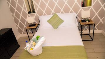 1 habitación, tabla de planchar con plancha, wifi gratis y ropa de cama