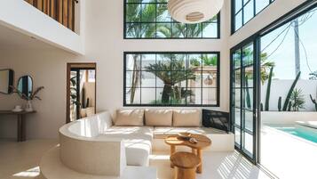Romantic Villa, Pool View | Living area | 32-inch TV with digital channels
