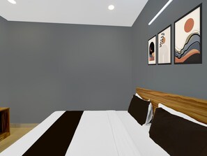 A modern bedroom with a large bed, grey walls, and three framed artworks.