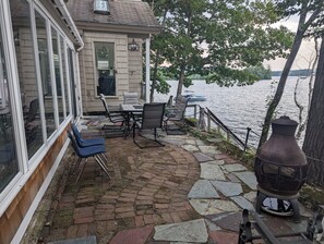 Outdoor dining - Spacious 4-bedroom house on enchanting Squam Lake - Sleeps 11 (Holderness)