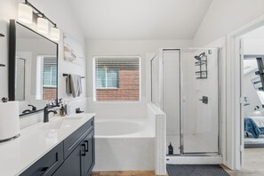 Jetted bath, towels, soap, toilet paper