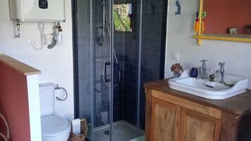 Shower, towels, soap, toilet paper