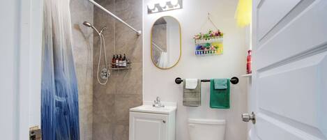 Shower, hair dryer, towels, soap