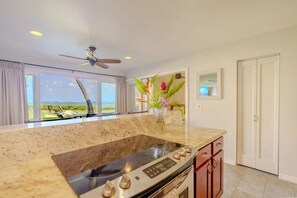 Fridge, microwave, oven, stovetop - Oceanfront Two-Bedroom Condo, Steps from the Sand and Pool (Kapaʻa)