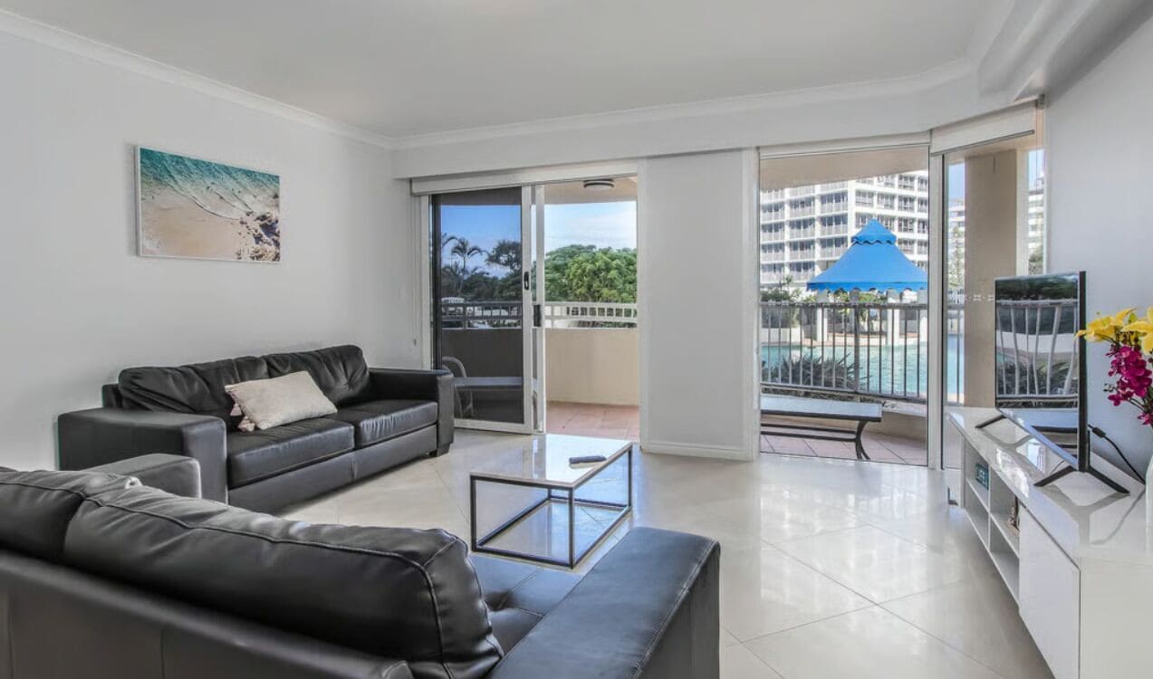 Apartment, Balcony, Pool View | Living area
