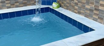 Beachfront house with pool, barbecue + Wi-Fi in Itanhaém, SP