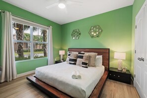 After a busy day at the theme parks, shopping, or exploring Central Florida, return to this relaxing bedroom where you can stretch out, enjoy some quiet time, and get the restful sleep you deserve. - 6BR Themed Villa w/ Game Room+ Pool & Spa Solterra (Davenport)