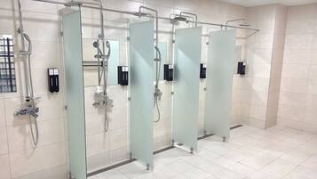 Shower, hair dryer, towels, shampoo