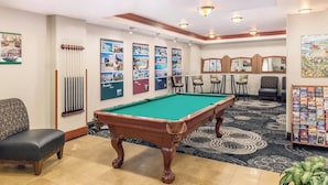 A pool table, chairs, a billiards rack, and a wall with framed pictures. - Convenient Acessible Studio Condo for Comic Con 2026 San Diego (San Diego)