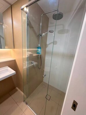 Shower, towels, soap, toilet paper - Modern 1 Bedroom Unit with Futon (Brisbane City)