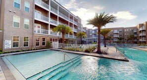 Outdoor pool - Modern 1BR Near Attractions • King Bed • Fast WiFi • Pool (Orlando)