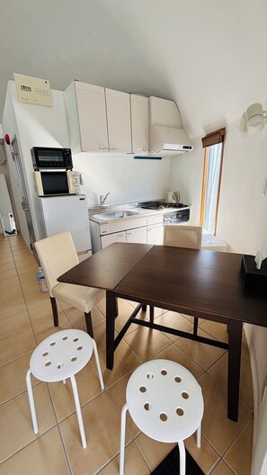 Apartament | Zona de menjador de l'habitació