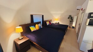 Apartament | Planxa i posts de planxar i wifi gratuïta 