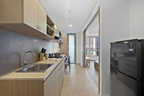 Apartment, 1 Bedroom, City View | Private kitchen - Premium Apartment by Kozystay - Antasari Place (Kota Jakarta Selatan)