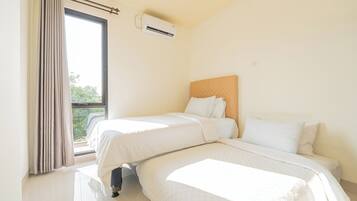 Apartment, Balcony, Garden View | Desk, laptop workspace, free WiFi