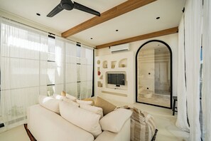 Deluxe Villa, 4 Bedrooms, Pool View | Living room - Casa Degaz Canggu (Canggu)