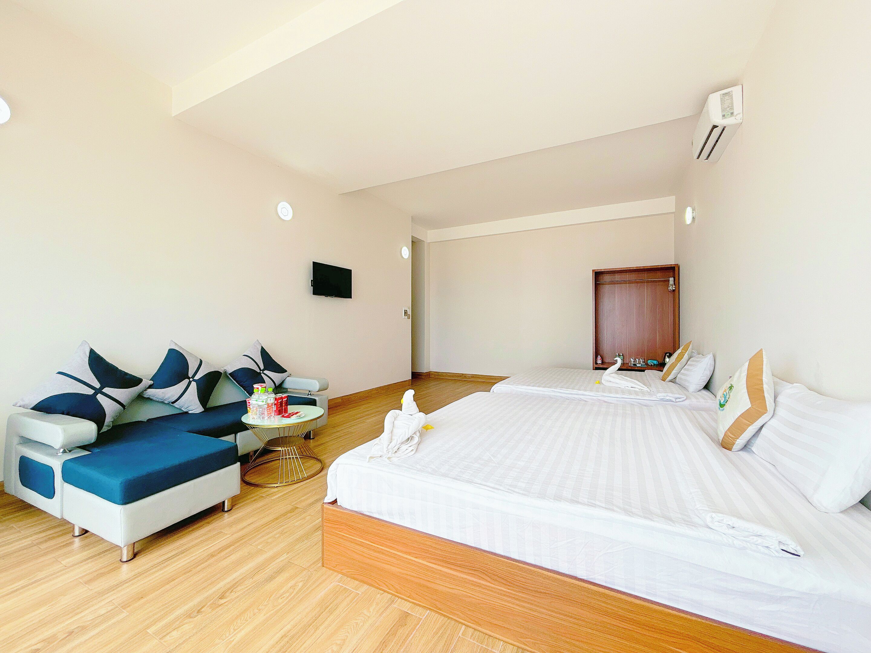 Quarto quádruplo, vista para a praia