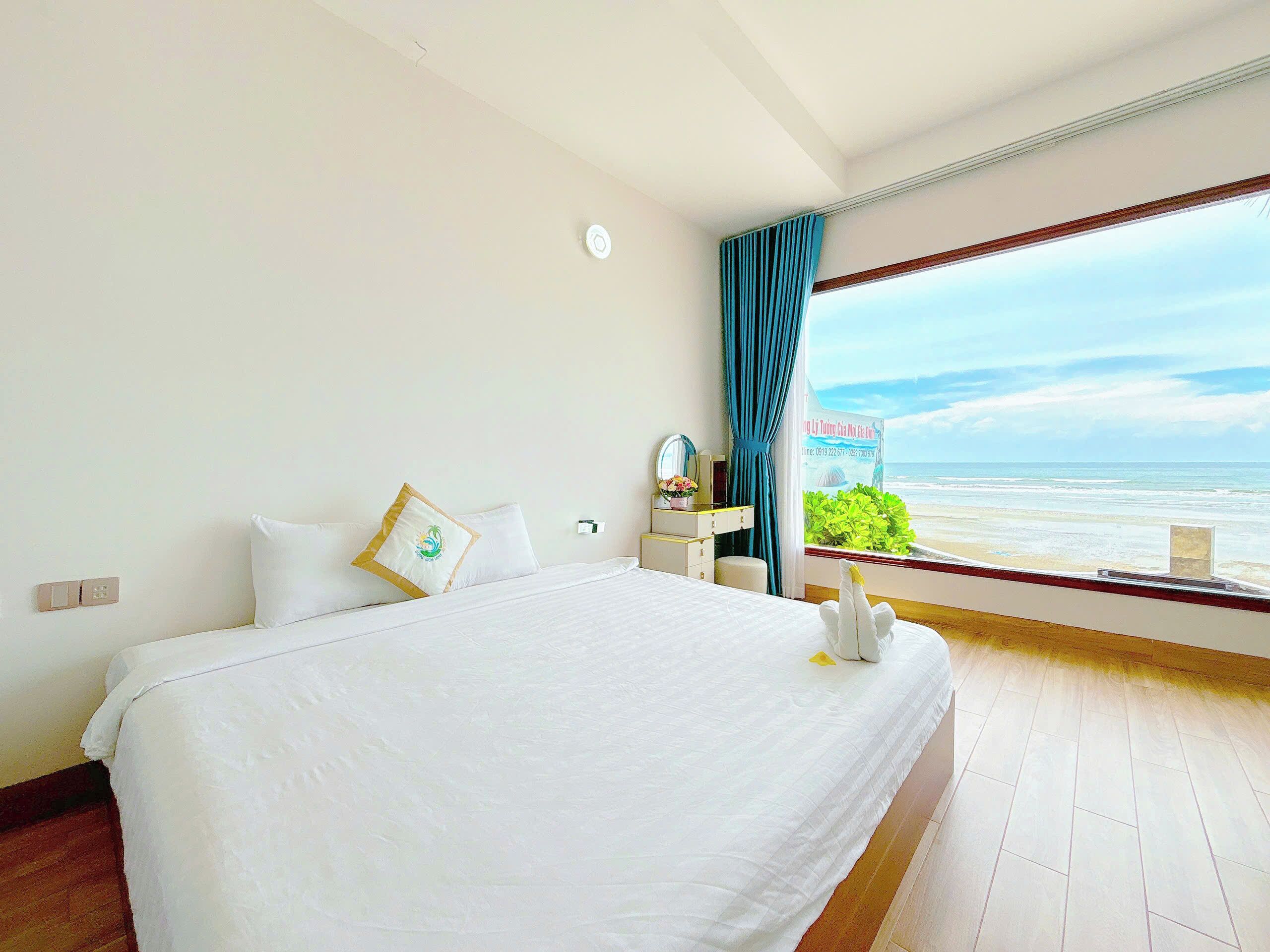 Quarto quádruplo, vista para a praia