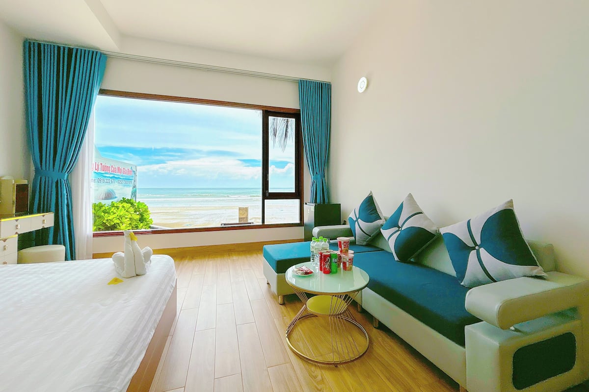 Quarto quádruplo, vista para a praia