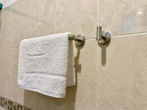 Shower, towels, soap, shampoo