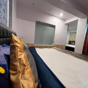 Quarto família, vista para a montanha