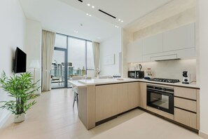 Exclusive Apartment, Balcony, City View | Private kitchen - PVH - Lavish 1BR - Private Pool (Dubai)
