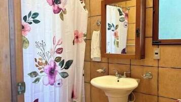 Shower, towels, soap, shampoo
