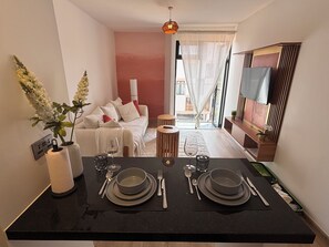 Living area - Cozy 1-bedroom apt in welcoming Tatu City with fitness room, pool, green space (Tatu City)