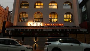 A hotel named 'Star Grand' with a bar and kitchen on the ground floor. - Mosaic Go Star Grand (Navi Mumbai)