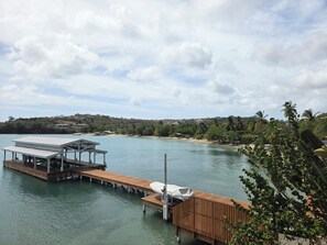 Property grounds - Waterfront condo with pool, beach 1 minute walk, in Lans Euxpines (Lance aux Epines)
