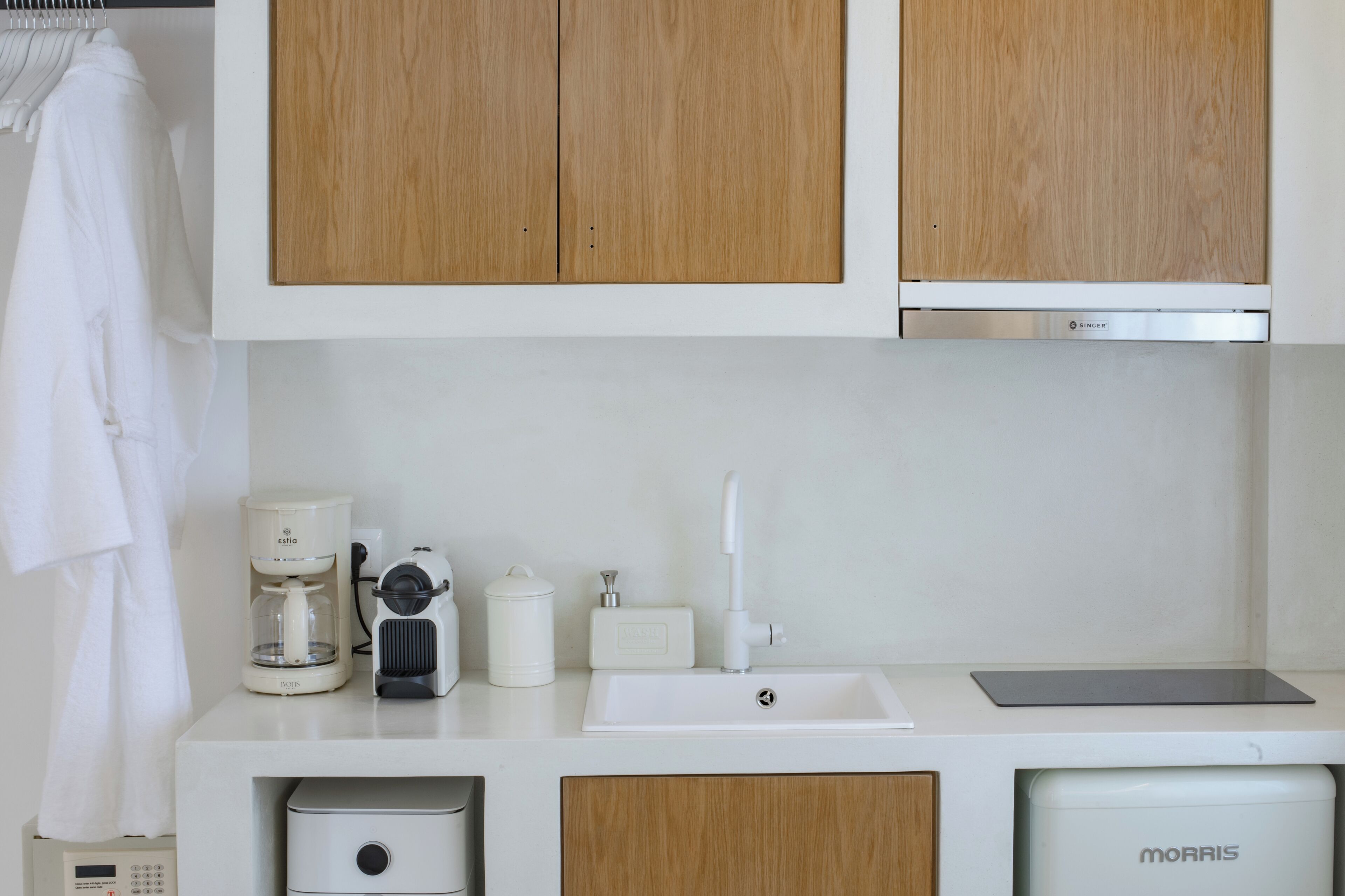 Mini-fridge, microwave, stovetop, cookware/dishes/utensils