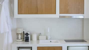 Mini-fridge, microwave, stovetop, cookware/dishes/utensils