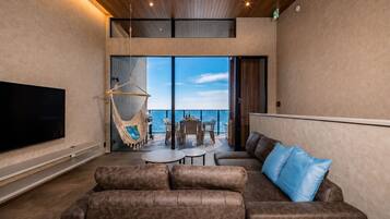 Luxury Villa, Ocean View | Living area | 55-inch flat-screen TV with cable channels