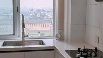 Suíte standard, vista para a cidade | Cozinha americana privada