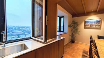 Luxury Suite, City View | Private kitchen