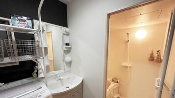 Hair dryer, bidet, towels, soap
