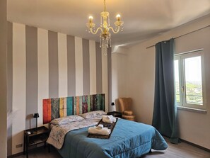 Deluxe Room, City View | Desk, laptop workspace, bed sheets -  IL PISTACCHIO (Agrigento)