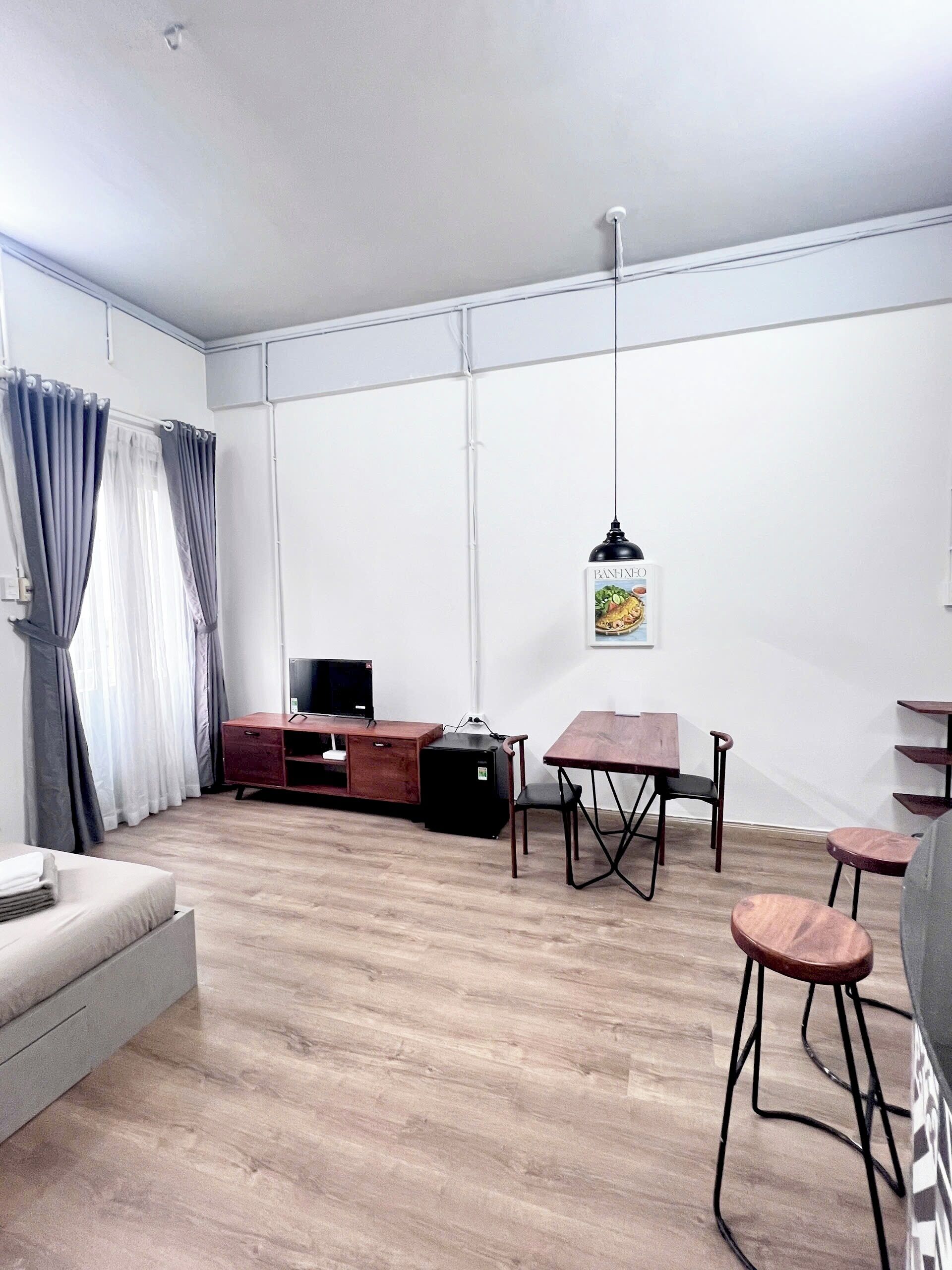 Deluxe-huoneisto, parveke, kaupunkinäköala | Oleskelualue