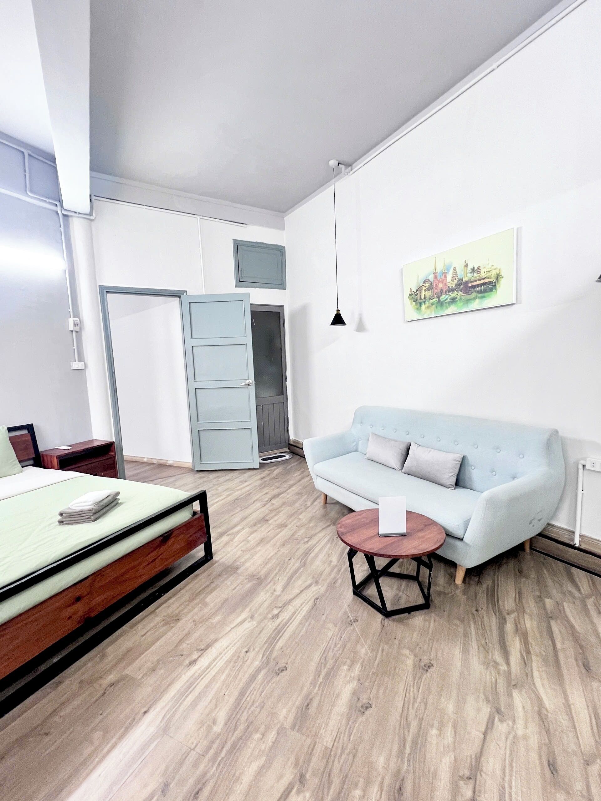 Deluxe-huoneisto, parveke, kaupunkinäköala | Oleskelualue