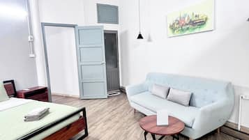 Deluxe-huoneisto, parveke, kaupunkinäköala | Oleskelualue