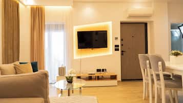 Apartment, Balcony | Living area | 35-inch flat-screen TV with satellite channels