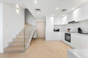 Fridge, microwave, oven, stovetop - Free housekeeping visits during your stay - StayShort - Stylish 1 Bedroom Duplex in DIFC that Sleeps 4! (DIFC)