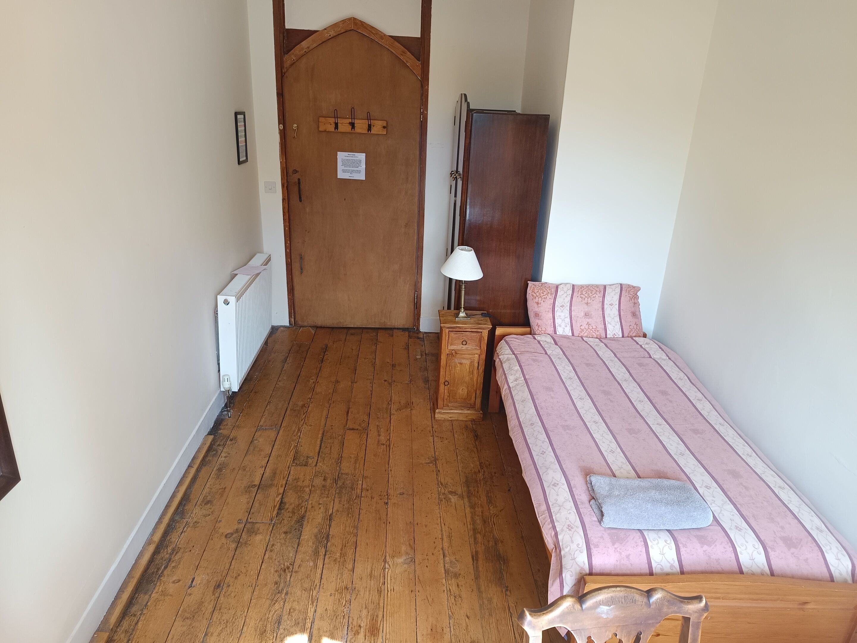 Habitación individual, baño compartido