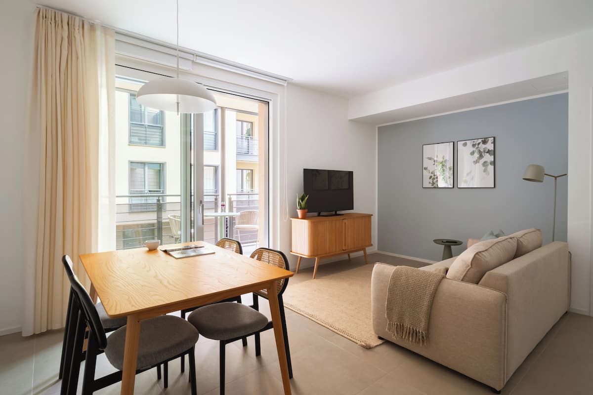 One Bedroom Comfort Apartment with Balcony | Living area