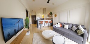 Family Apartment, Balcony, City View | Living area - Golf Chateau Serviced Apartments (Mawal)