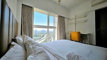 Luxury Apartment, Kitchen, City View | Desk, laptop workspace, iron/ironing board, free WiFi